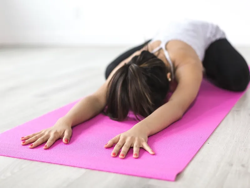 Woman doing pilates at home